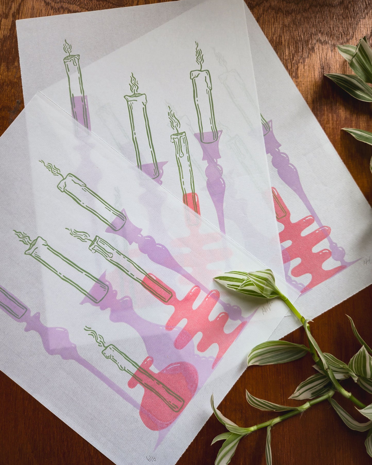 Sheet of paper with printed designs of candles 