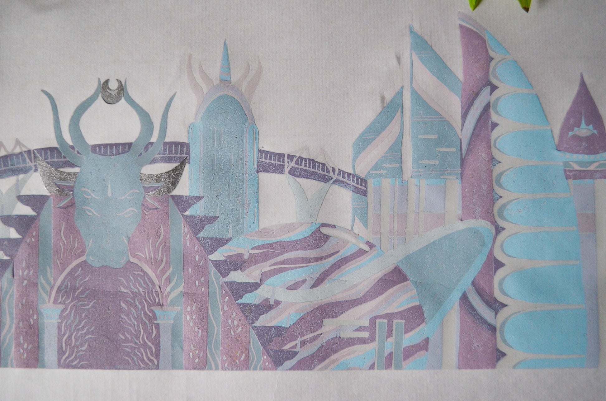 Close up of a pastel coloured linocut print of futuristic sci-fi buildings